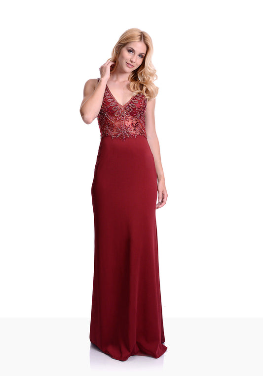 Elegant evening dress with embellished beaded bodice. V neckline design with sheer illusion bodice. Super pretty red fitted evening and prom dress.