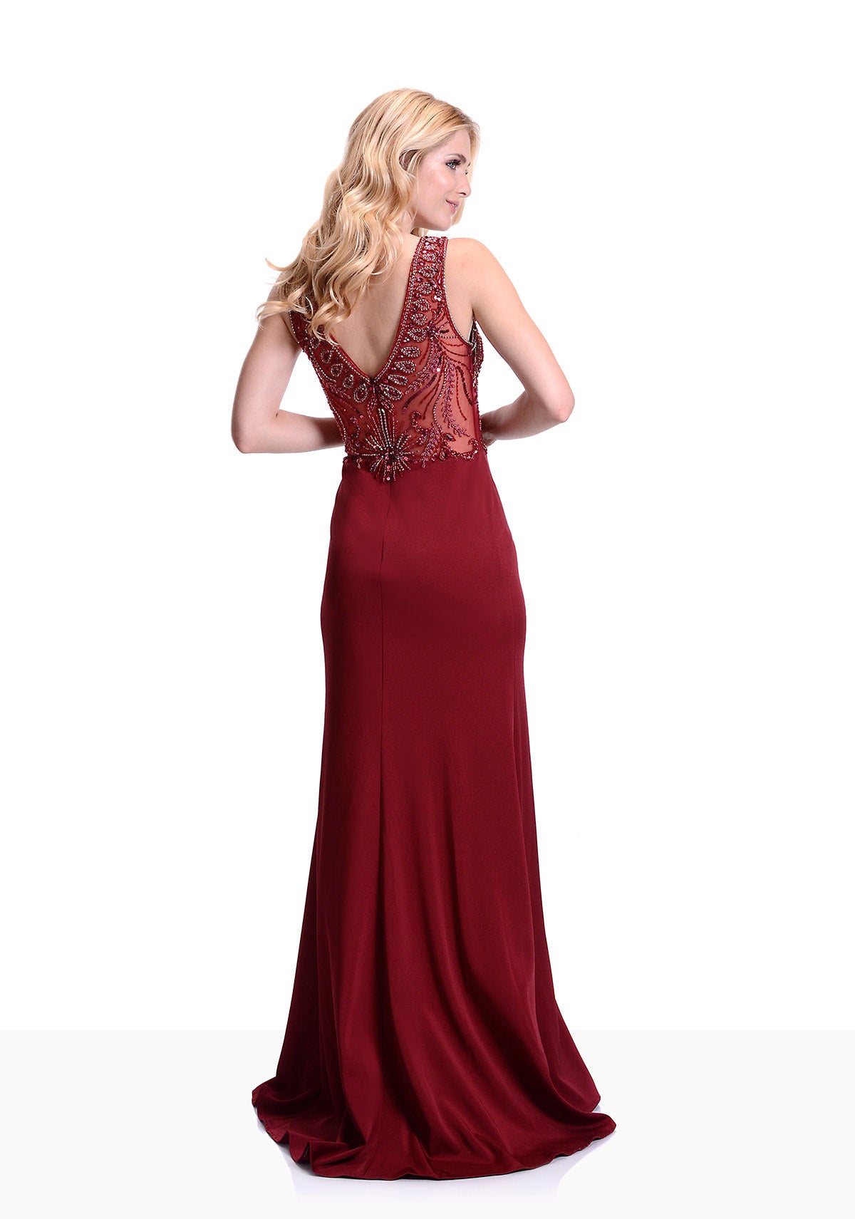 Elegant evening dress with embellished beaded bodice. V neckline design with sheer illusion bodice. Super pretty red fitted evening and prom dress.